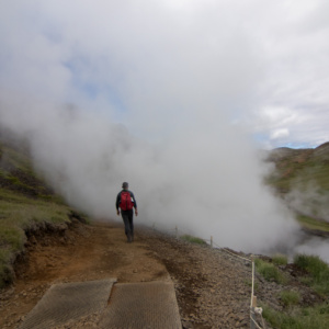 Man walking into steam
