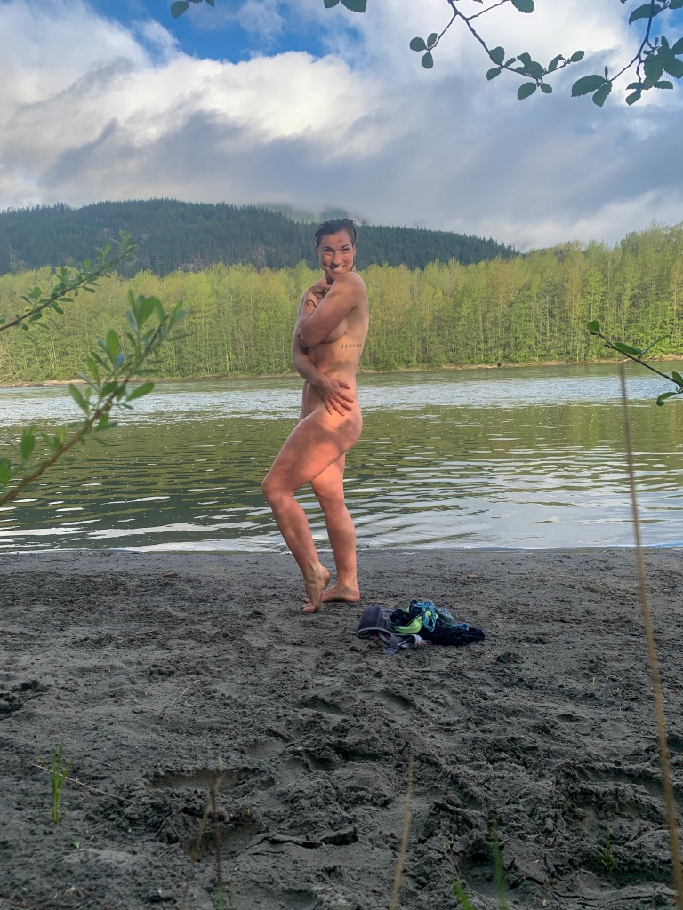 Nude woman goes swimming